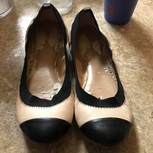 Banana Republic ballet flats.  Cream with black tie and elastic.  Lining is worn
